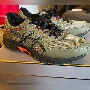 Men’s ASICS gel sneakers.  Worn once they were too big.